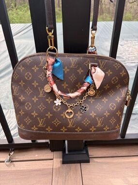 Authentic Louis Vuitton Monogram Purse with Scarf-Wrapped Handle and Charm Chain